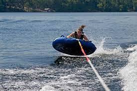 Tubing behind boat