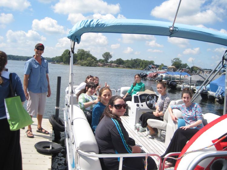 Group renting pontoon boat on Pine Lake